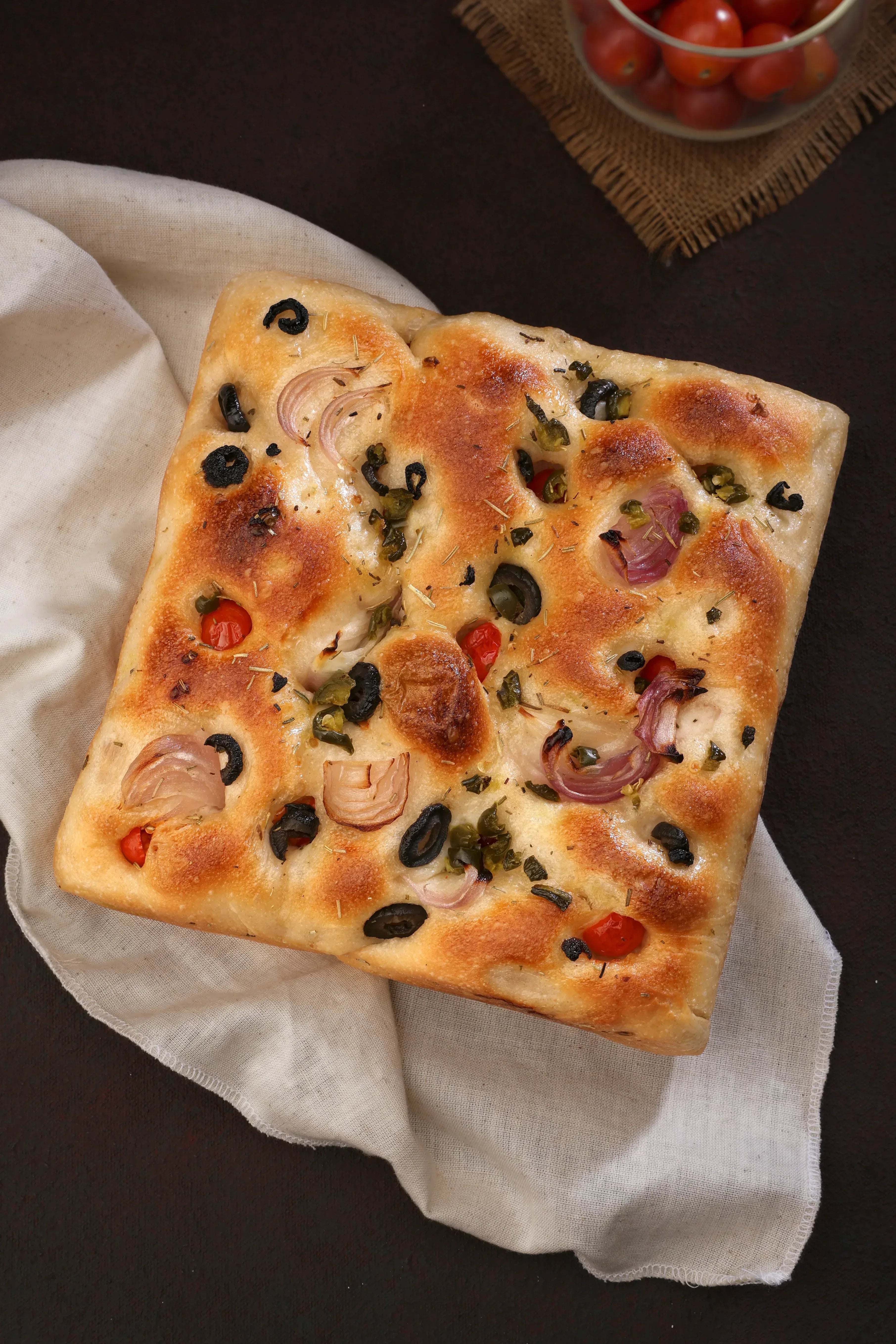 Cherry Tomato, Olives, Onion, Rosemary, Jalapeño, Sea Salt Focaccia