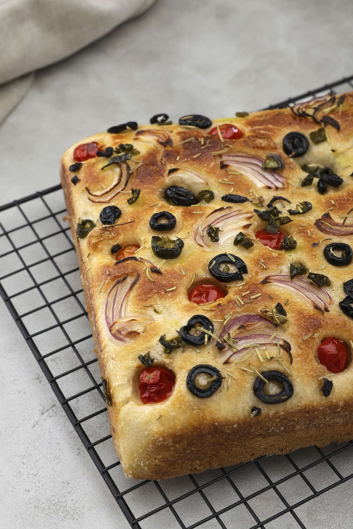 Cherry Tomato, Olives, Onion, Rosemary, Jalapeño, Sea Salt Focaccia